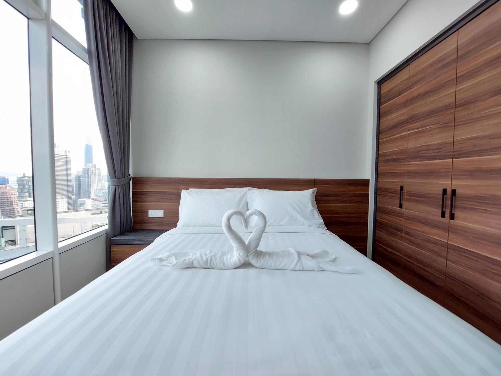 Sky Suites With Klcc Twin Tower View By Irent365 Kuala Lumpur Quarto foto